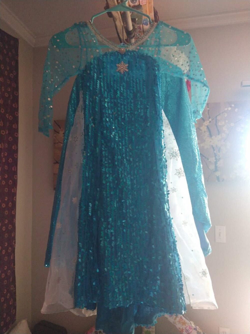 Beautiful embellishments of Elsa Costume and sequin cape and accessories